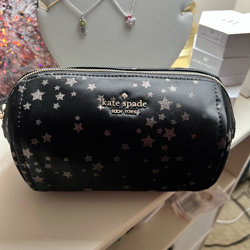 Black and gold Kate spade roll make up bag